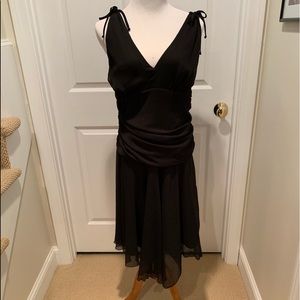 Black cocktail dress, flattering ruching.Worn once